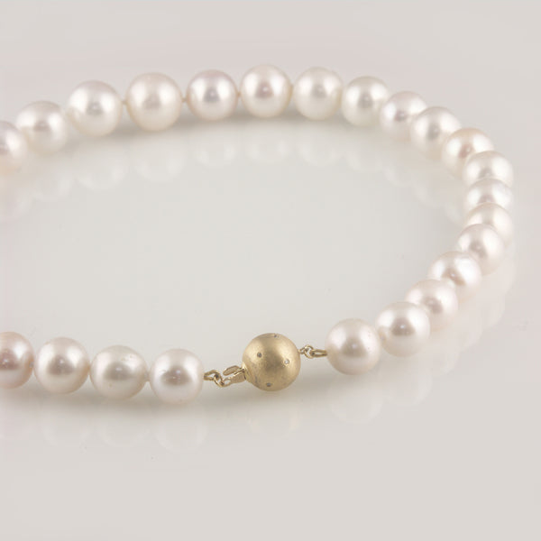 'Pearl Wonder' - Pearl necklace with 18ct gold ball clasp and diamonds