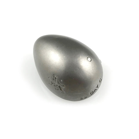 'Best Before' - matt black silver egg brooch with diamond