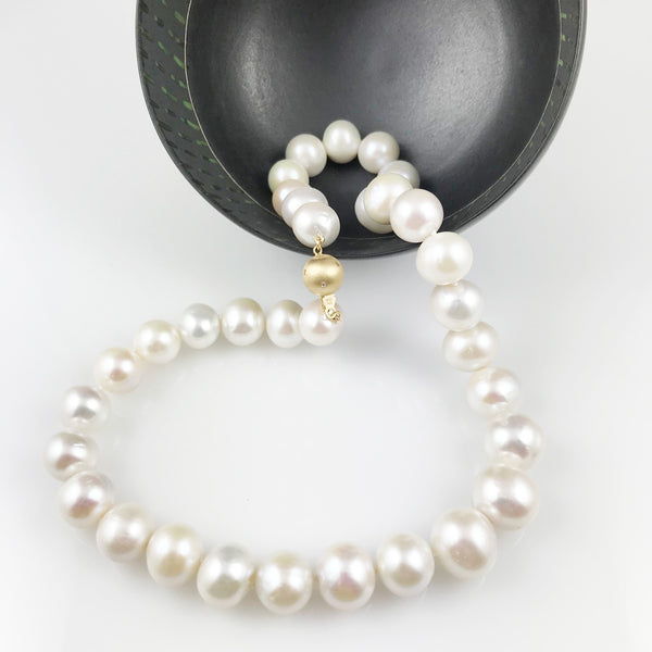 'Pearl Wonder' - Pearl necklace with 18ct gold ball clasp and diamonds