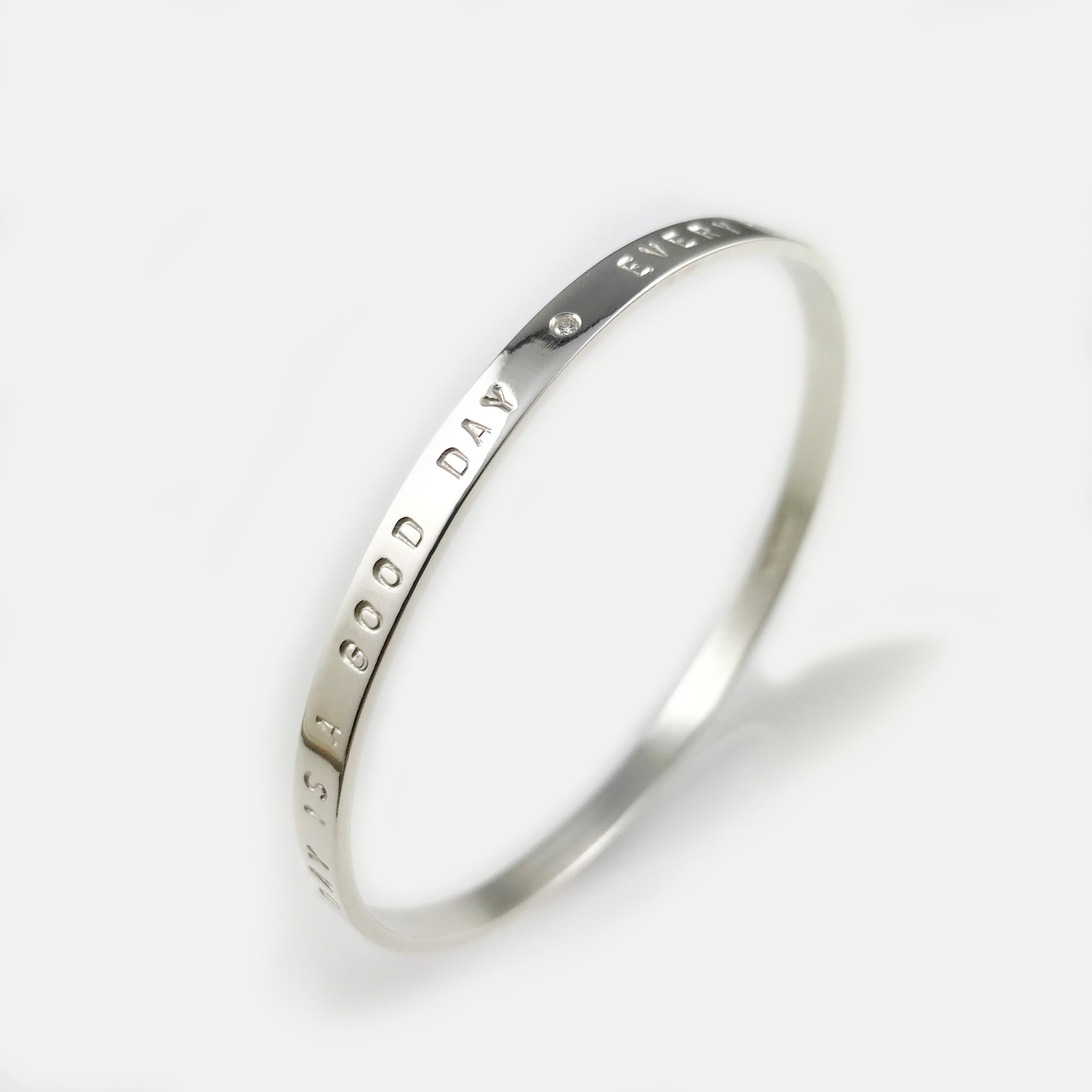 'Every day is a good day and Every day is a holiday' - silver round shape bangle with diamond