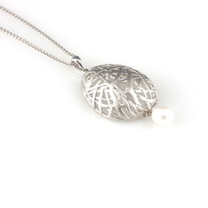 'Best Before' - 3cm silver egg necklace with pearls