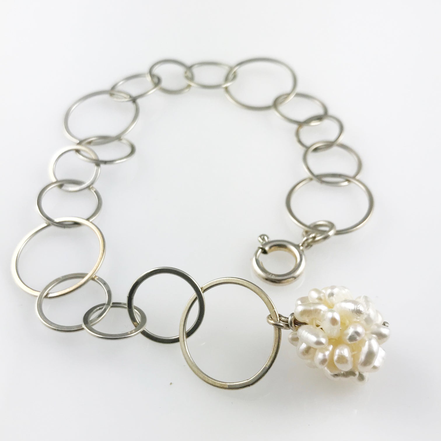 Silver bracelet with cluster of rice pearls