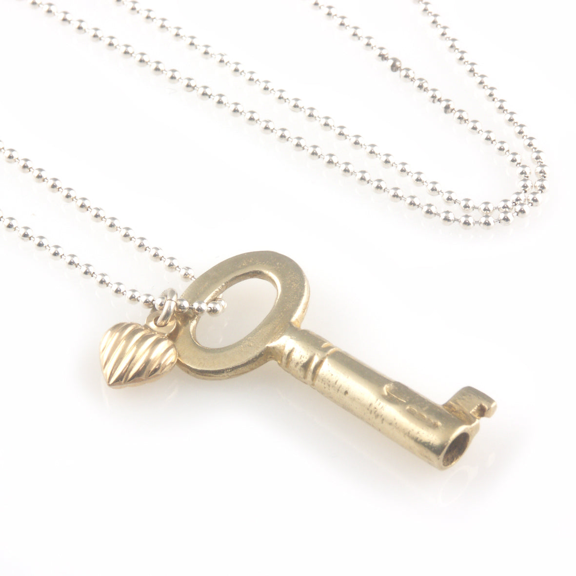 'Key to your heart' - Gold plated silver key and a gold heart necklace