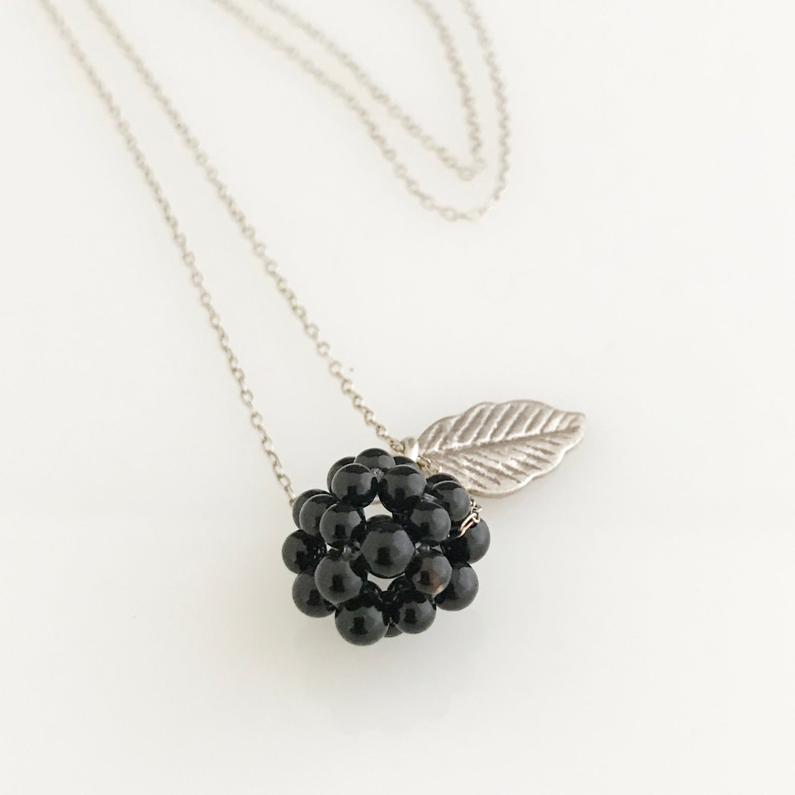 Onyx cluster with silver leaf necklace