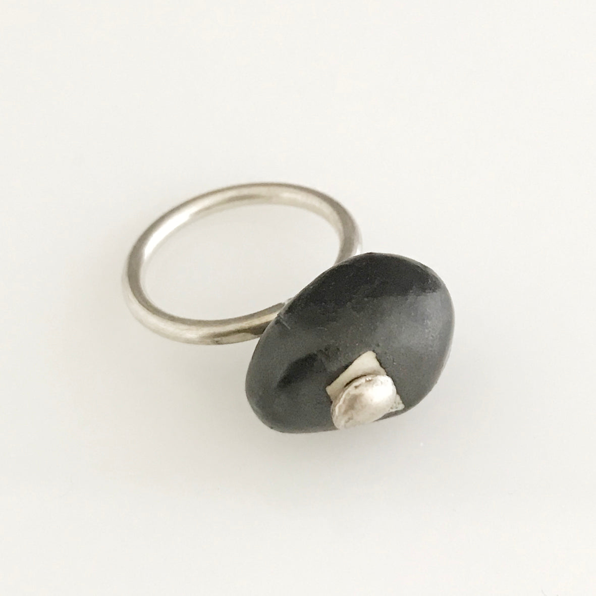 Black porcelain stone shaped silver ring
