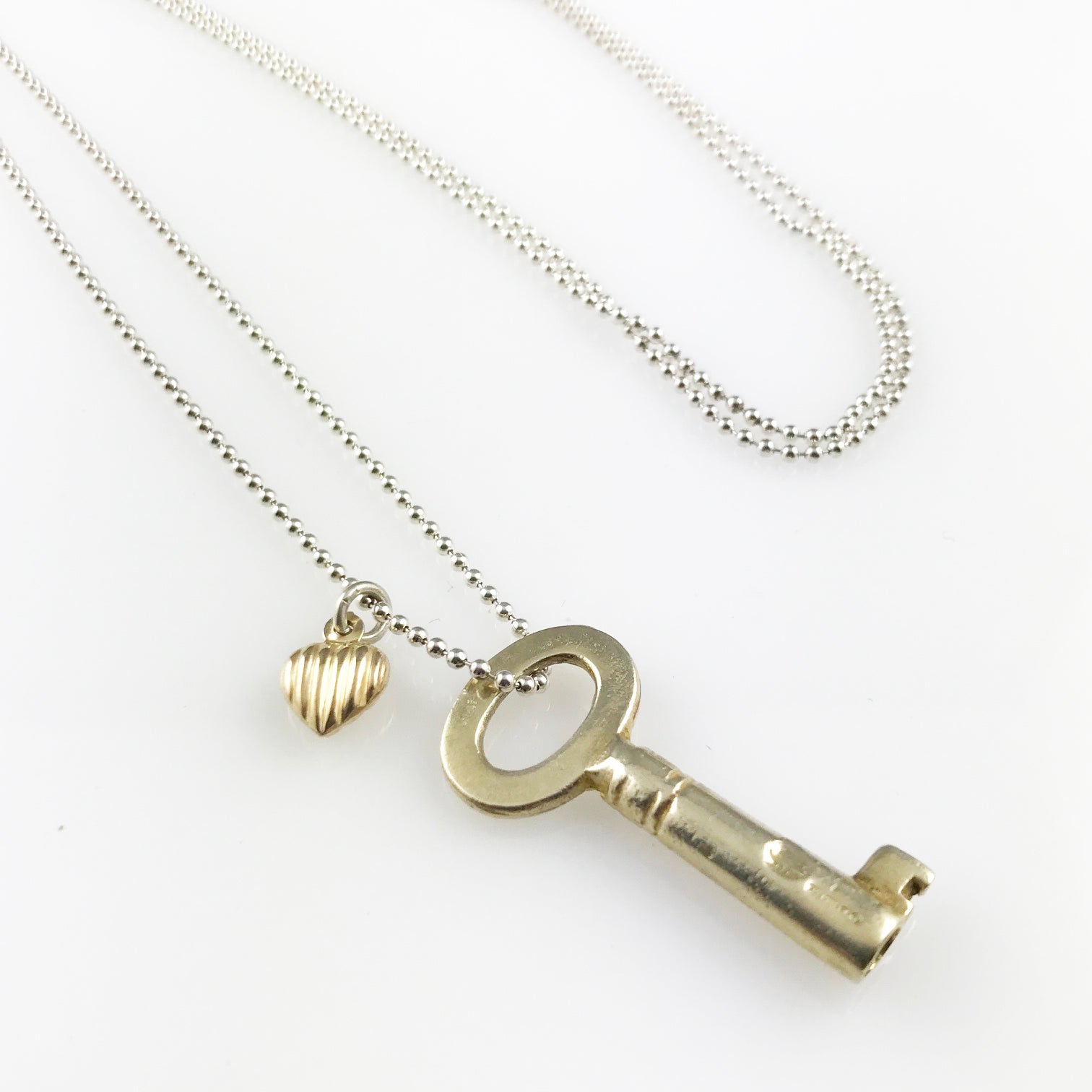 'Key to your heart' - gold plated silver key necklace with small gold heart