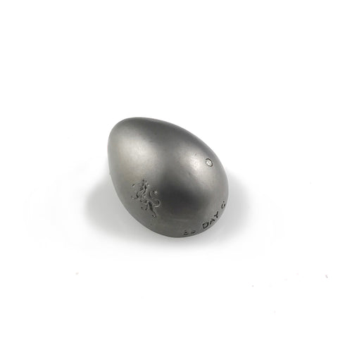 'Best Before' - matt black silver egg brooch with diamond