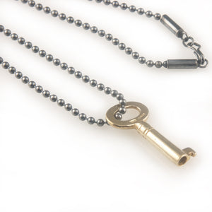 'Key to your heart' - oxidised silver necklace with gold plated silver key