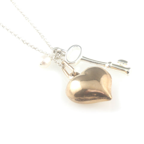 'Key to your heart' - small silver key and pearl with rose gold heart necklace