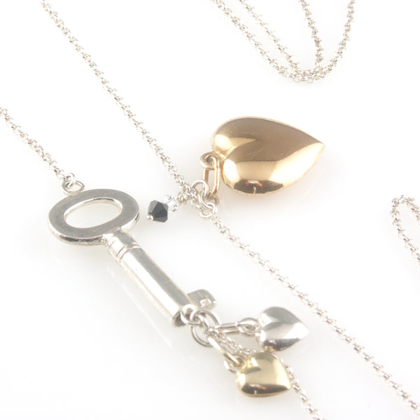 'Key to your heart' - long silver key and hearts necklace