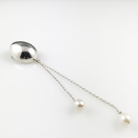 Silver egg brooch with silver chain and pearls drop