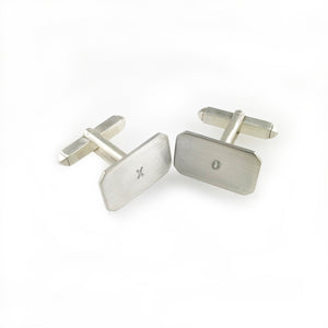 'X collection' - silver cufflinks with words 'X' and 'O'